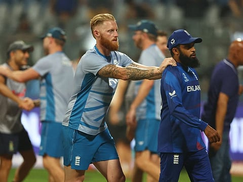 England's Ben Stokes and Adil Rashid look dejected after the match against South Africa at Wankhede Stadium, Mumbai, on Saturday.