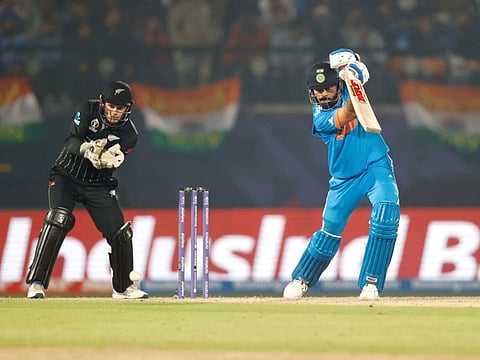 India's Virat Kohli drives the ball during their match against New Zealand in the World Cup at Himachal Pradesh Cricket Association Stadium, in Dharamsala on Sunday.