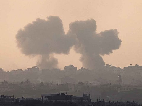 A picture taken from Israel's southern city of Sderot shows smoke billowing during an Israeli strike on Gaza on October 22, 2023.