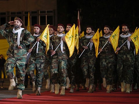 Members of Hezbollah march during a rally in Beirut. Lebanese militant group Hezbollah is allied with Hamas, which touched off the latest violence with a bloody October 7 rampage in Israel that killed at least 1,400 people, mostly civilians, according to Israeli officials.