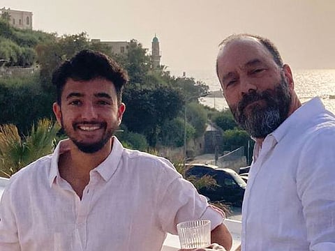 Hersh Goldberg-Polin, left, with his father Jon Polin.