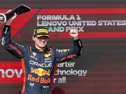 Red Bull Racing's Dutch driver Max Verstappen celebrates on the podium after winning the 2023 United States Formula One Grand Prix in Austin, Texas, on Sunday.