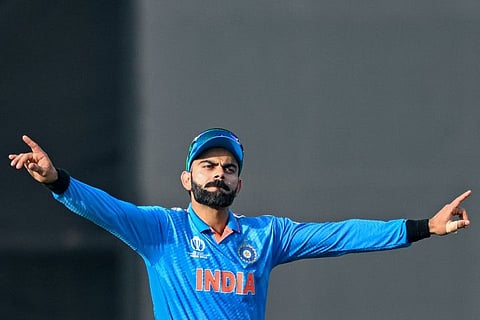 India's Virat Kohli dances to music during the World Cup match against New Zealand in Dharamsala on Sunday.