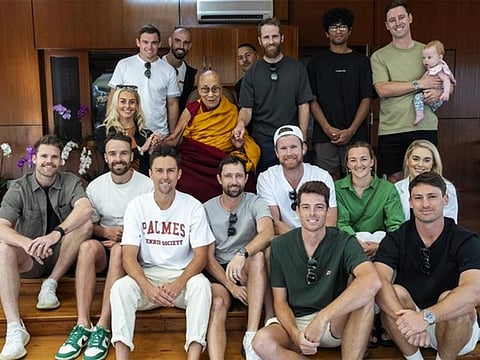 The New Zealand team members pose with Dalai Lama at his residence in McLeodganj.