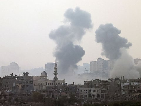 Smoke is rising after an Israeli strike on Gaza seen from a viewpoint in Southern Israel.
