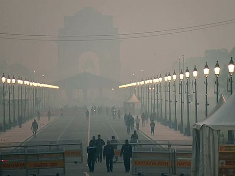 New Delhi, Oct 25 (ANI): India Gate is enveloped in a layer of smog as the air quality in the national capital improves to 'Moderate' category with the Air Quality Index (AQI) at 190, at the Kartavya Path, in New Delhi on Wednesday.