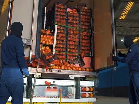 The illicit drugs were found hidden inside the cavities of the pomegranates.