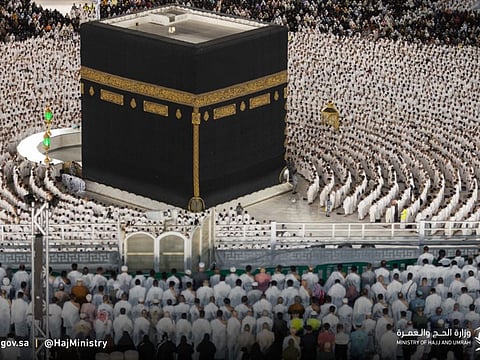 Umrah pilgrims at the courtyard around the Holy Kaaba at the Grand Mosque in Mecca.