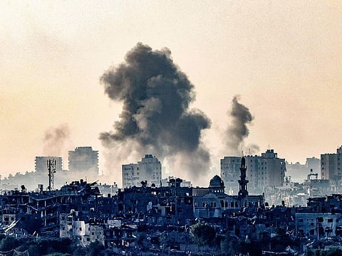 Smoke ascending over the northern Gaza Strip following an Israeli strike.