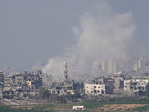 Smoke rises following an Israeli airstrike in the Gaza Strip, as seen from southern Israel, Saturday, October 28, 2023.