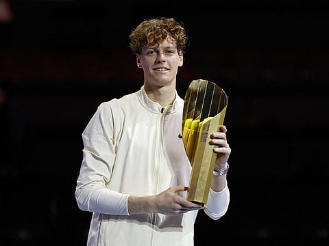 Italy's Jannik Sinner with the trophy after winning the final against Russia's Daniil Medvedev in the Vienna Open on Sunday.
