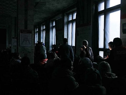 Relatives of miners gather at the Kostenko coal mine during a power outage, as a rescue operation continues following a mine fire, in Karaganda, Kazakhstan October 28, 2023.
