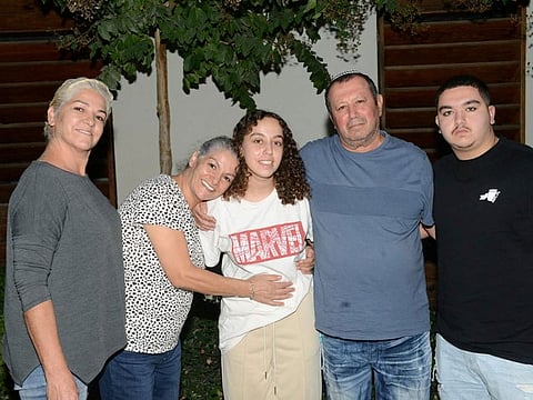 Israeli soldier Ori Megidish is seen surrounded with her family members.