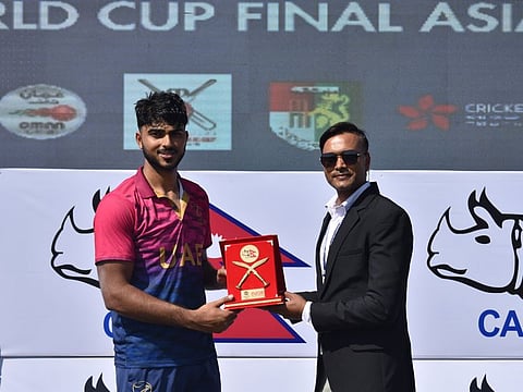 Ali Naseer receiving the man of the match award after guiding UAE to victory in the Twenty20 World Cup Qualifier Final on Monday.