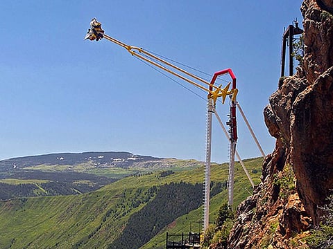 File photo: People ride the Giant Canyon Swing at Glenwood Caverns Adventure Park in Glenwood Springs, Colorado.