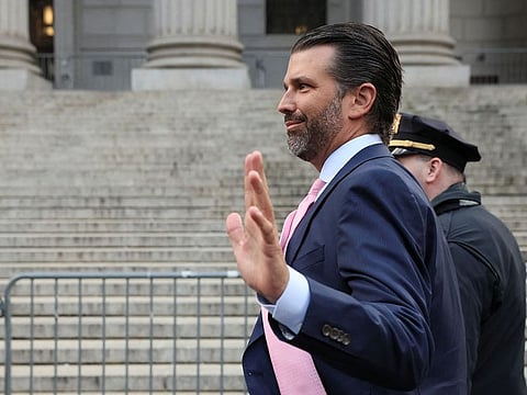 Former US President Donald Trump's son and co-defendant, Donald Trump Jr., arrives to attend the Trump Organization civil fraud trial, in New York State Supreme Court.
