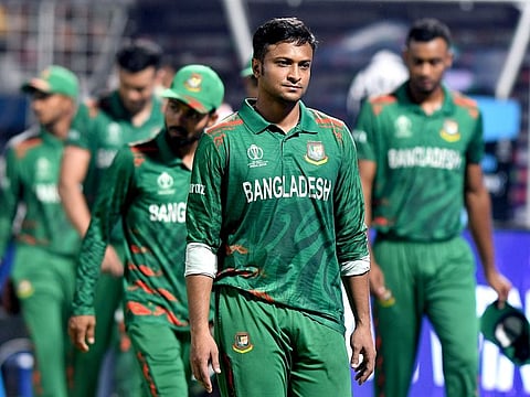 Bangladesh's skipper Shakib Al Hasan and teammates look dejected after losing the match against Pakistan in the Cricket World Cup at Eden Gardens in Kolkata on Tuesday.