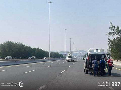 Medics and an air ambulance at the scene of the accident.