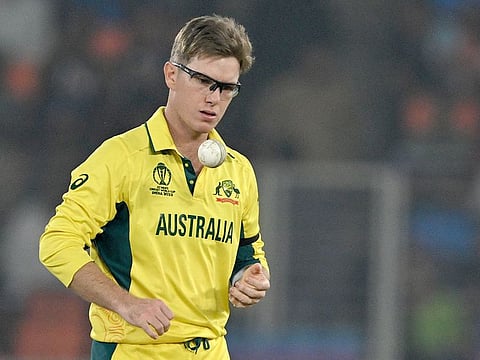 Australia's Adam Zampa tosses the ball during the 2023 ICC Men's Cricket World Cup match against England at the Narendra Modi Stadium in Ahmedabad on November 4, 2023.