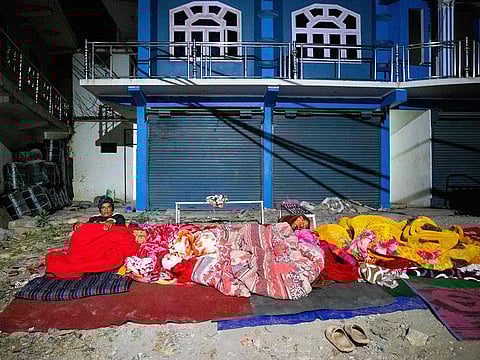 Residents sleep outdoors in Jajarkot district.