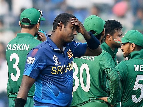 Sri Lanka's Angelo Mathews reacts after being 'timed out' during the match against Bangladesh in the ICC Men's Cricket World Cup 2023, at Arun Jaitley Stadium in New Delhi on Monday.