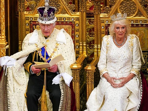 Britain's King Charles III delivers a speech beside Queen Camilla during the State Opening of Parliament in the House of Lords Chamber, in London, Britain, November 7, 2023.