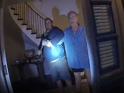 This still image from a San Francisco Police Department police body-cam video ordered released by San Francisco Superior Court, shows suspect David DePape (L) assaulting Paul Pelosi, husband of former Speaker of the House Nancy Pelosi, at their San Francisco home on October 28, 2022.