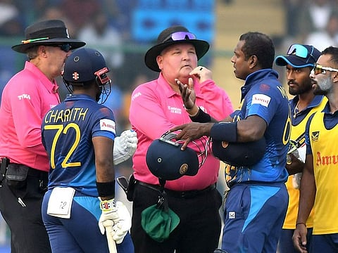 Sri Lanka’s Angelo Mathews in a discussion with the umpires after being timed out during the match against Bangladesh in the Cricket World Cup 2023, at the Arun Jaitley Stadium in New Delhi on November 6, 2023. This was the first such dismissal in international cricket, sparking the spirit of the game debate.