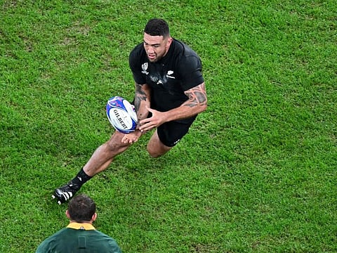 New Zealand's hooker Codie Taylor runs with the ball during the 2023 Rugby World Cup final against South Africa at the Stade de France in Saint-Denis on October 28.