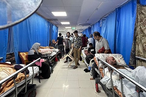 Patients and internally displaced people at Al Shifa hospital in Gaza City on November 10, 2023.