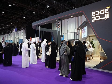 Exhibitors and visitors networking at the event, which offers career opportunities in both public and private sectors