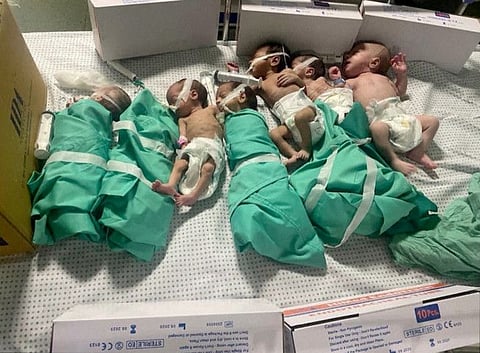 Newborns are placed in bed after being taken off incubators in Gaza's Al Shifa hospital after power outage, amid the ongoing conflict between Israel and the Palestinian Islamist group Hamas, in Gaza City on November 12, 2023.