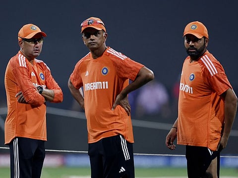 India's Rohit Sharma with head coach Rahul Dravid and chief selector Ajit Ajarkar during a practice session on the eve of the World Cup semifinals against New Zealand in Mumbai on Tuesday.
