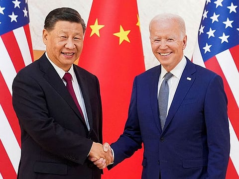 US President Joe Biden shakes hands with Chinese President Xi Jinping as they meet on the sidelines of the G20 leaders' summit in Bali, Indonesia, November 14, 2022.