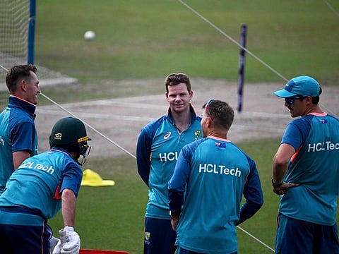 Australia's Steve Smith (centre) speaks with teammates during a practice session ahead of their Cricket World Cup semi-final match against South Africa at the Eden Gardens in Kolkata on Wednesday.