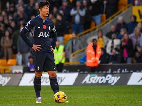 Tottenham's Son Heung-min reacts after Wolverhampton Wanderers' Mario Lemina scoring his side's second goal during the Premier League match at the Molineux Stadium, in Wolverhampton, England, on November 11.