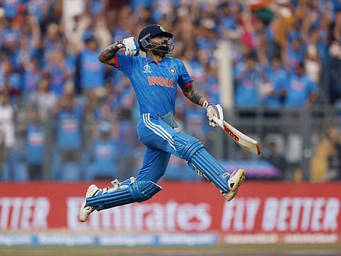 Indian ace Virat Kohli celebrates after reaching his 50th century in One-Day Internationals, breaking Sachin Tendulkar's record, during the semifinals against New Zealand in Mumbai.