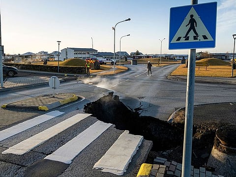 A crack cutting across the main road in Grindavik, southwestern Iceland following earthquakes.