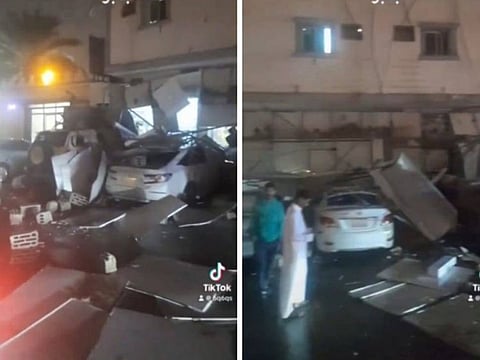 Screenshots purportedly showing several cars damaged by rainy wind in Riyadh.
