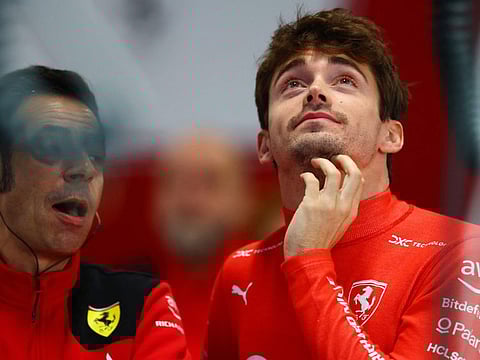 Charles Leclerc looks on in the garage during practice ahead of the F1 Grand Prix of Las Vegas on Friday.