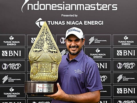 India's Gaganjeet Bhullar with the trophy after winning the BNI Indonesia Masters held at the Royale Jakarta Golf Club in Jakarta.