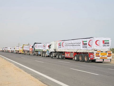 The convoy of trucks carrying UAE aid setting off towards Rafah Crossing.