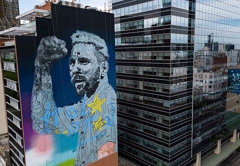 A mural depicting Lionel Messi, by artist Martin Ron, adorns a building on the 9 de Julio avenue in Buenos Aires, Argentina on Saturday.