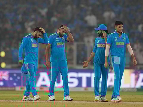 Indian players react after losing the final to Australia by 6 wickets during the ICC Men's Cricket World Cup final match in Ahmedabad, India, Sunday, Nov.19, 2023. (AP Photo/Aijaz Rahi)