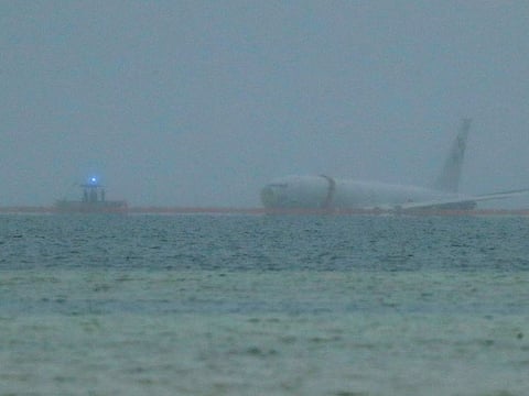 A downed US Navy aircraft is seen in Kaneohe Bay, Monday, Nov. 20, 2023, in Kaneohe, Hawaii.