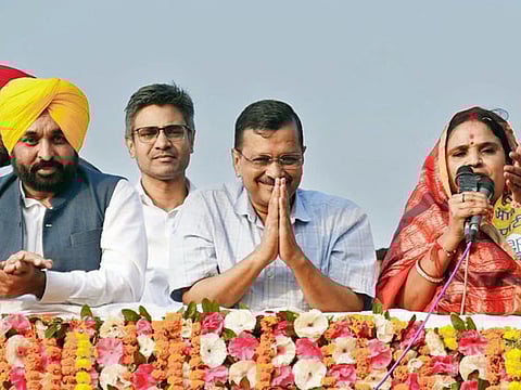 Delhi CM and AAP's National Convenor Arvind Kejriwal and Punjab Chief Minister Bhagwant Mann during a roadshow for the Madhya Pradesh assembly elections, in Binaganj, Chachoda