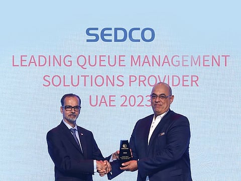 Majdi Shawish, CEO of SEDCO accepts the IBM Award