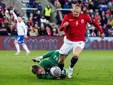 Norway's Erling Braut Haaland in action with Faroe Islands' Bardur a Reynatrod during a International Friendly in Oslo, Norway on November 16.