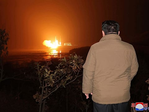 In this photo provided by the North Korean government, North Korean leader Kim Jong Un watches a rocket launch from a launching centre in North Korea, Tuesday, Nor. 21, 2023.