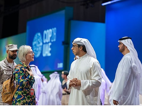 Sheikh Mansour bin Zayed Al Nahyan (2nd left) and Sultan Ahmed Al Jaber (right) during the tour of Expo City Dubai to inspect the final preparations for COP28.